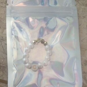 White Beaded Ring with Gold Accents